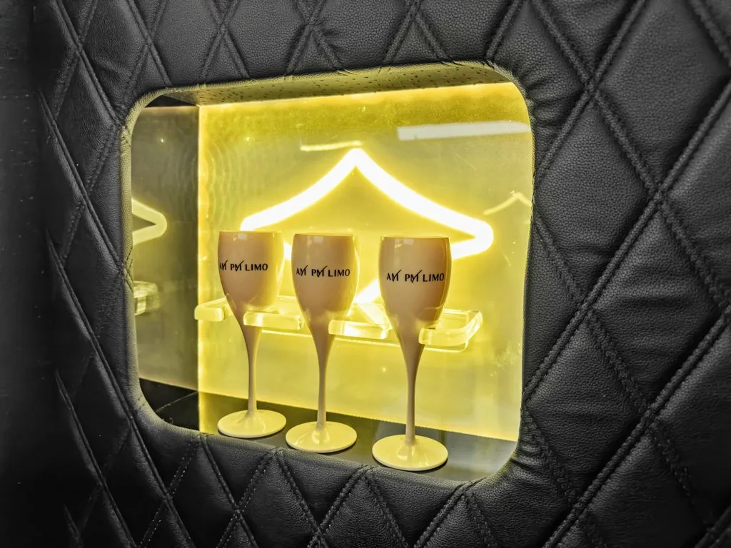 image of 10 passenger Cadillac CT5 limousine lighted glass holder cubby