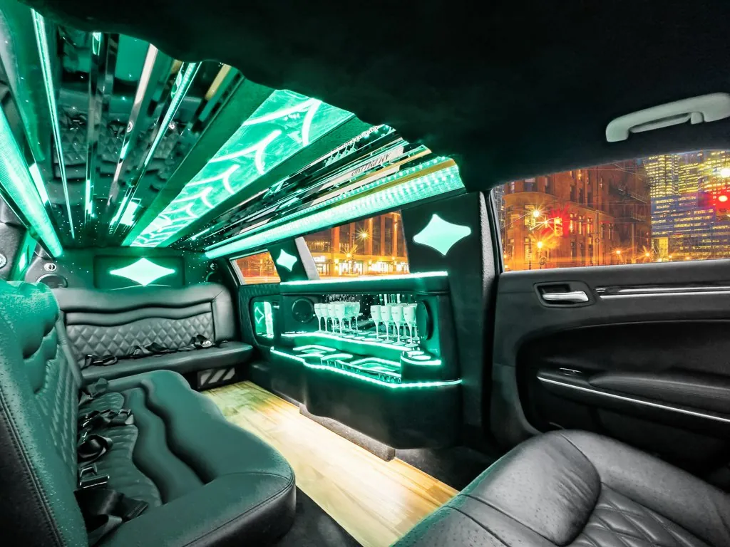image of 10 passenger Cadillac CT5 limousine interior from rear driver side bench