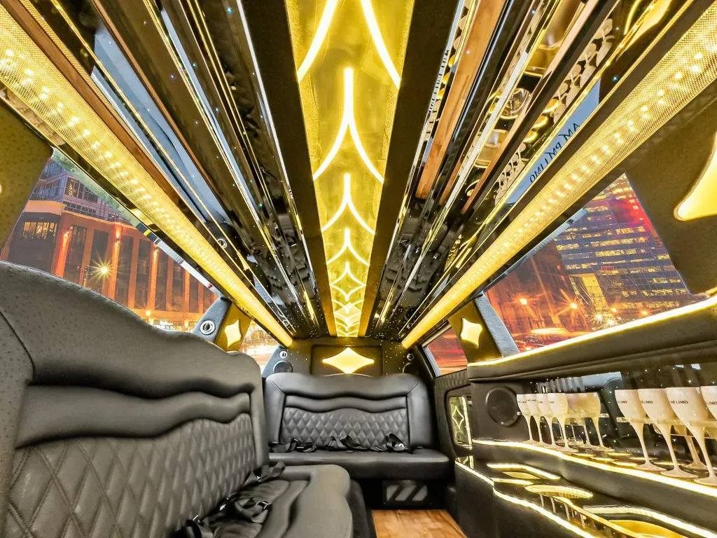 image of 10 passenger Cadillac CT5 limousine interior from middle rear bench seat
