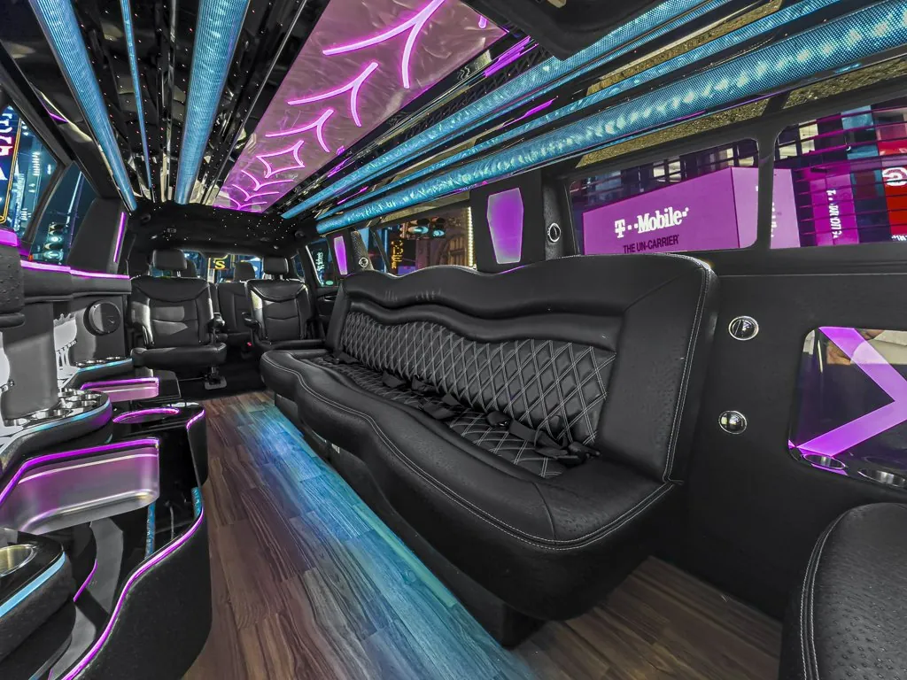 image of 14 passenger Cadillac XT6 limousine interior from rear driver side door