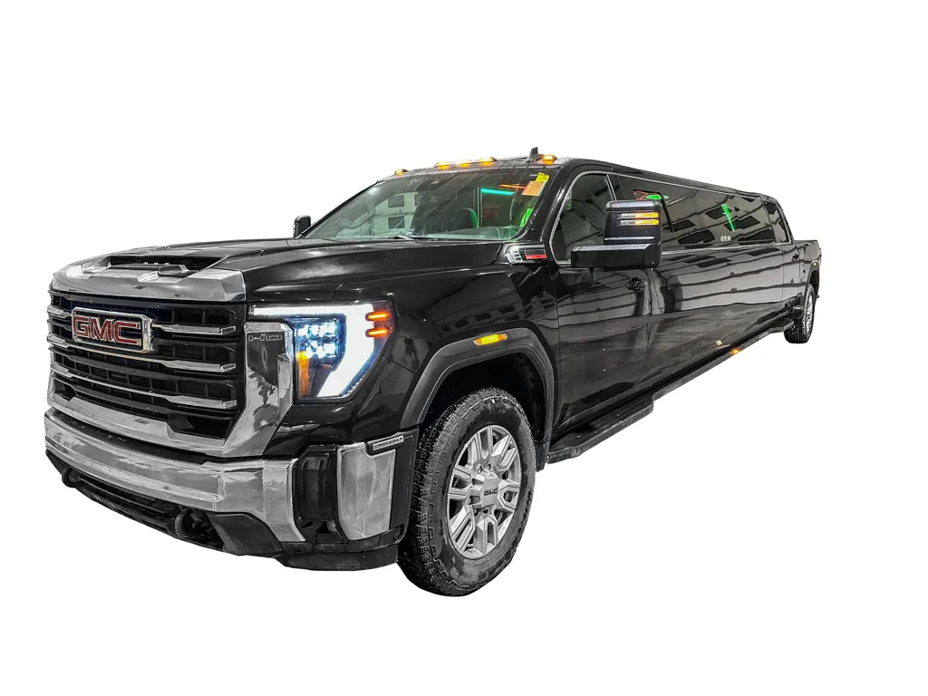 image of 16 passenger GMC Sierra stretched limousine exterior front driver side