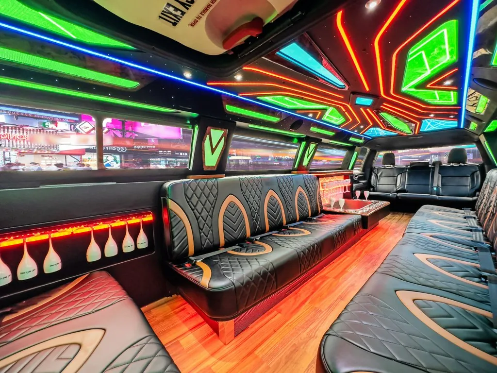 image of 16 passenger GMC Sierra stretched limousine interior from rear passenger side bench