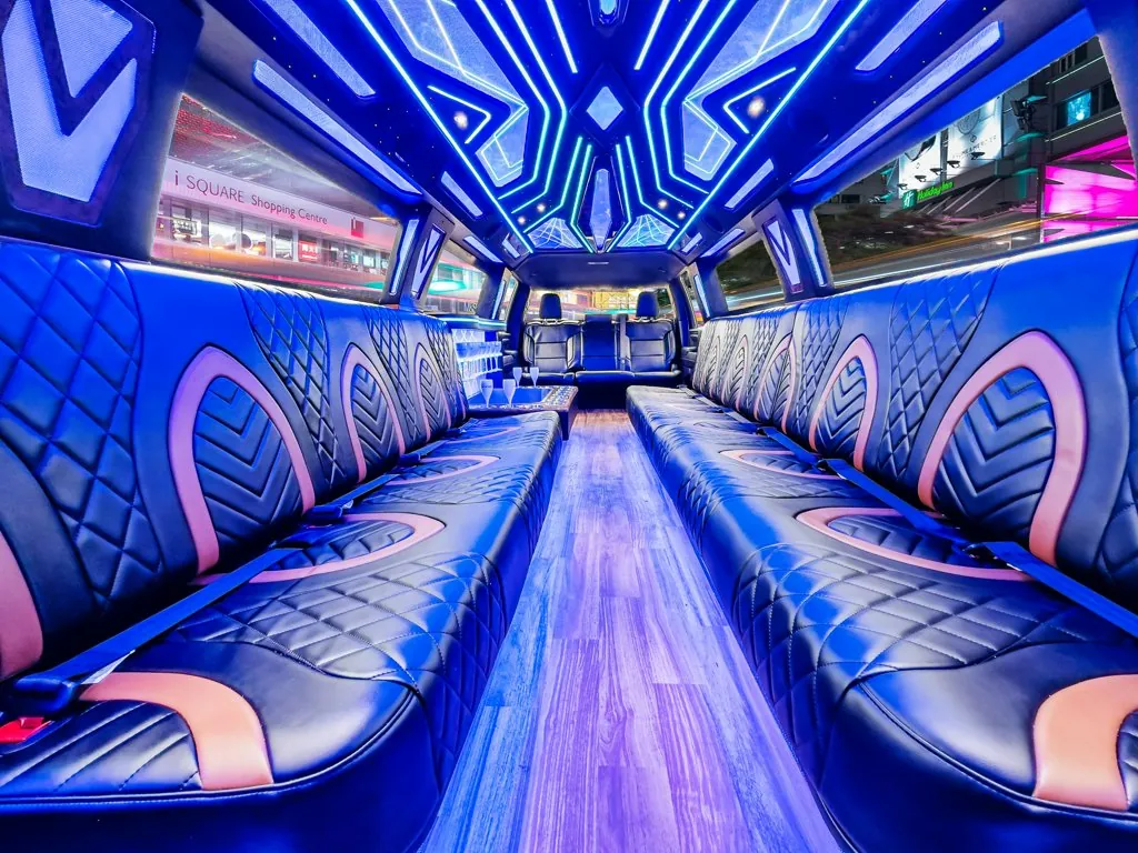 image of 16 passenger GMC Sierra stretched limousine interior view from front bench seat