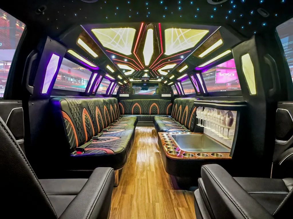 image of 20 passenger Cadillac Escalade stretched limousine interior taken from rear bench seat