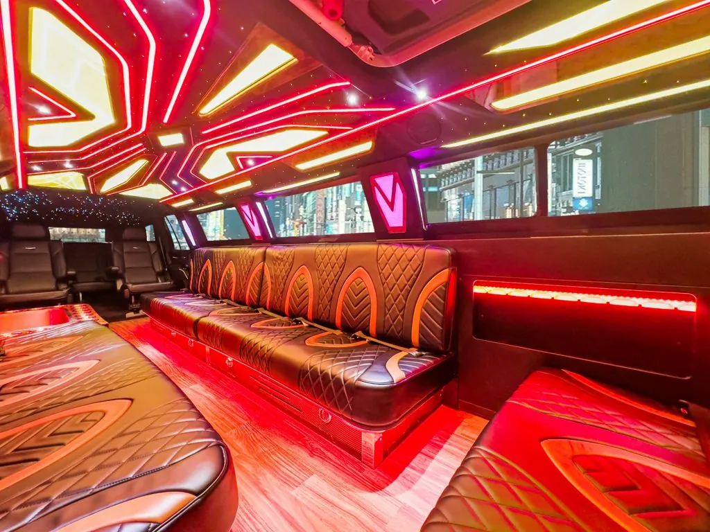 image of 20 passenger Cadillac Escalade stretched limousine interior taken from rear driver side door