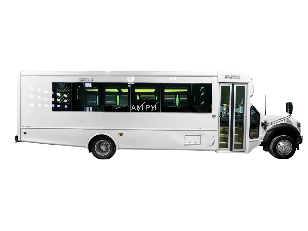 image of 28 passenger Party Bus full exterior passenger side